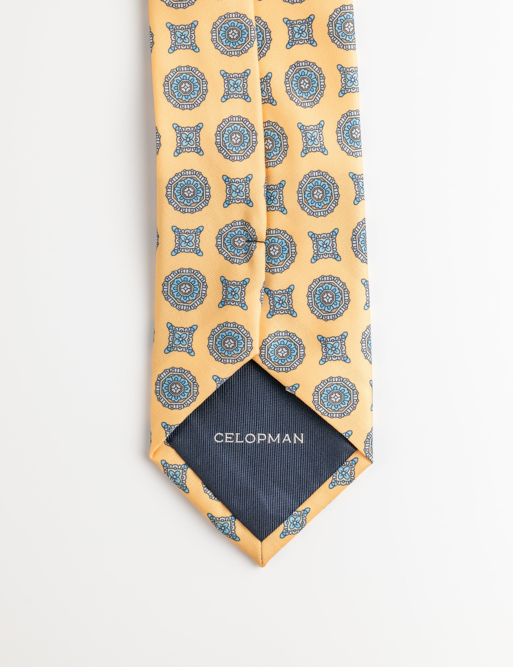CORBATA AMARILLA AZULEJO