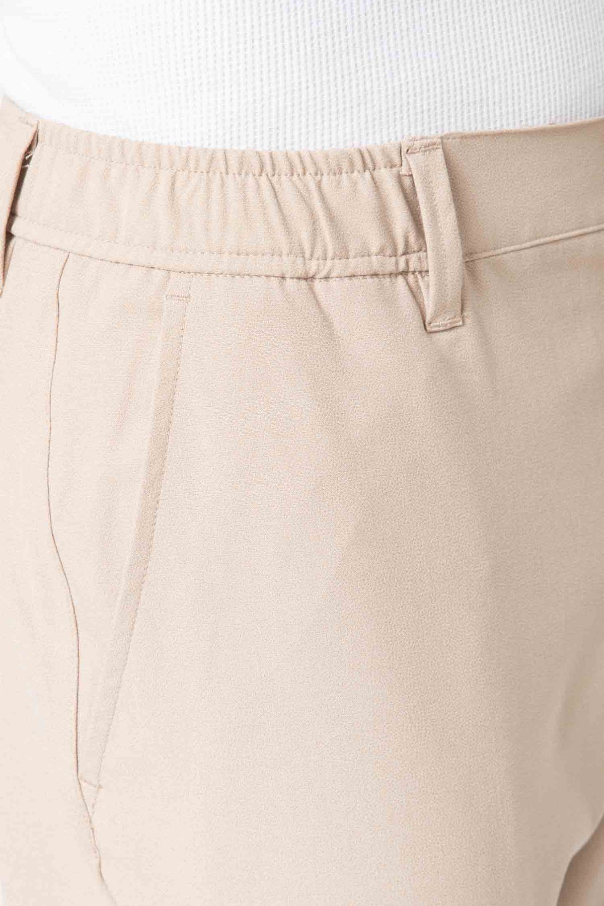 PANTALÓN CASUAL GOMA VESTIR BEIGE