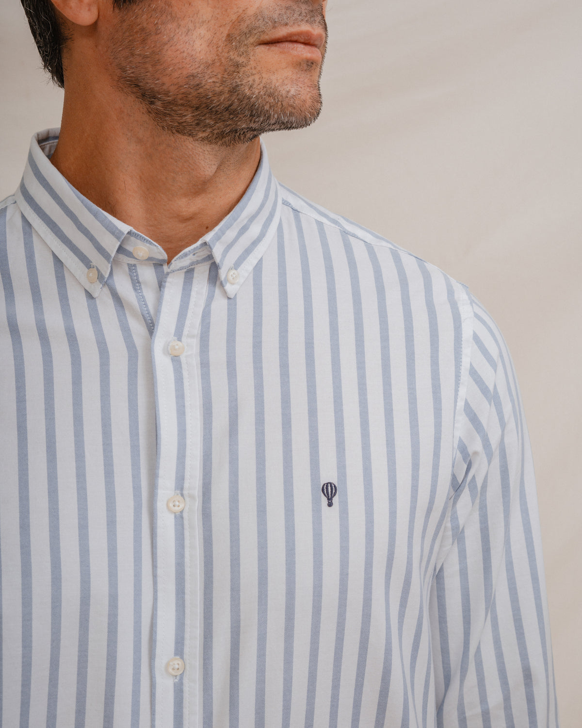 CAMISA OXFORD LISTRADA AZUL CELESTE
