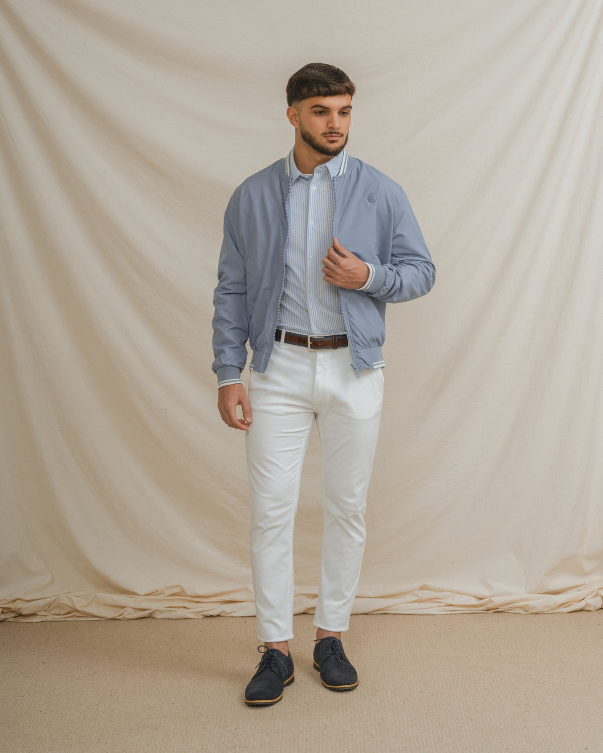 CAZADORA BOMBER LEVE AZUL-CELESTE