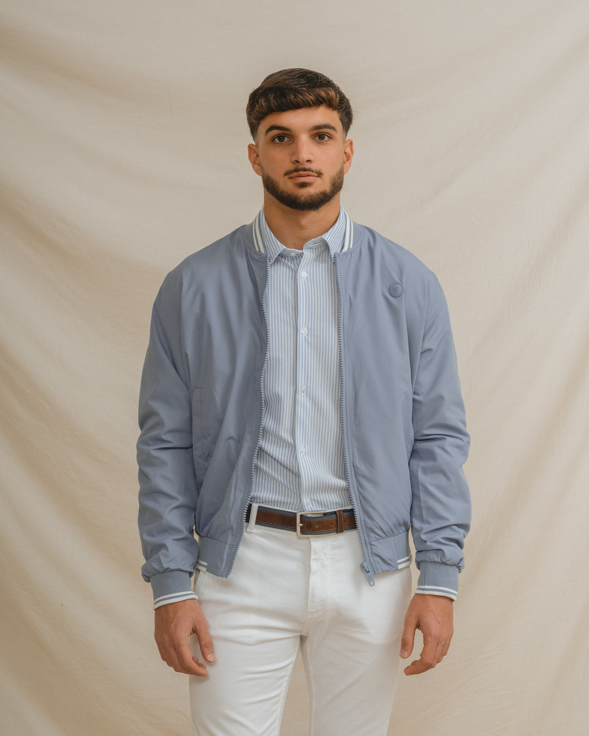 CAZADORA BOMBER LEVE AZUL-CELESTE