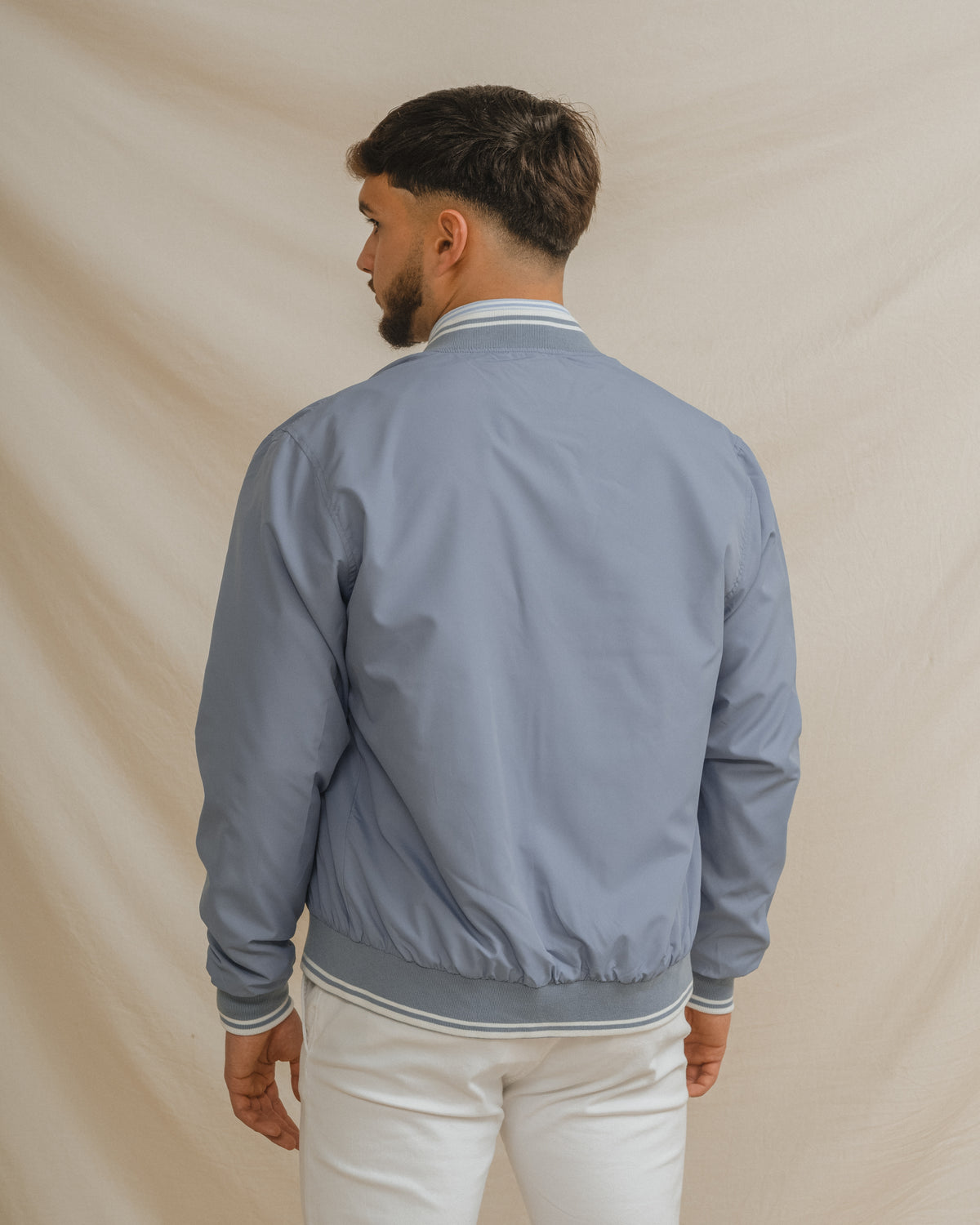 CAZADORA BOMBER LEVE AZUL-CELESTE
