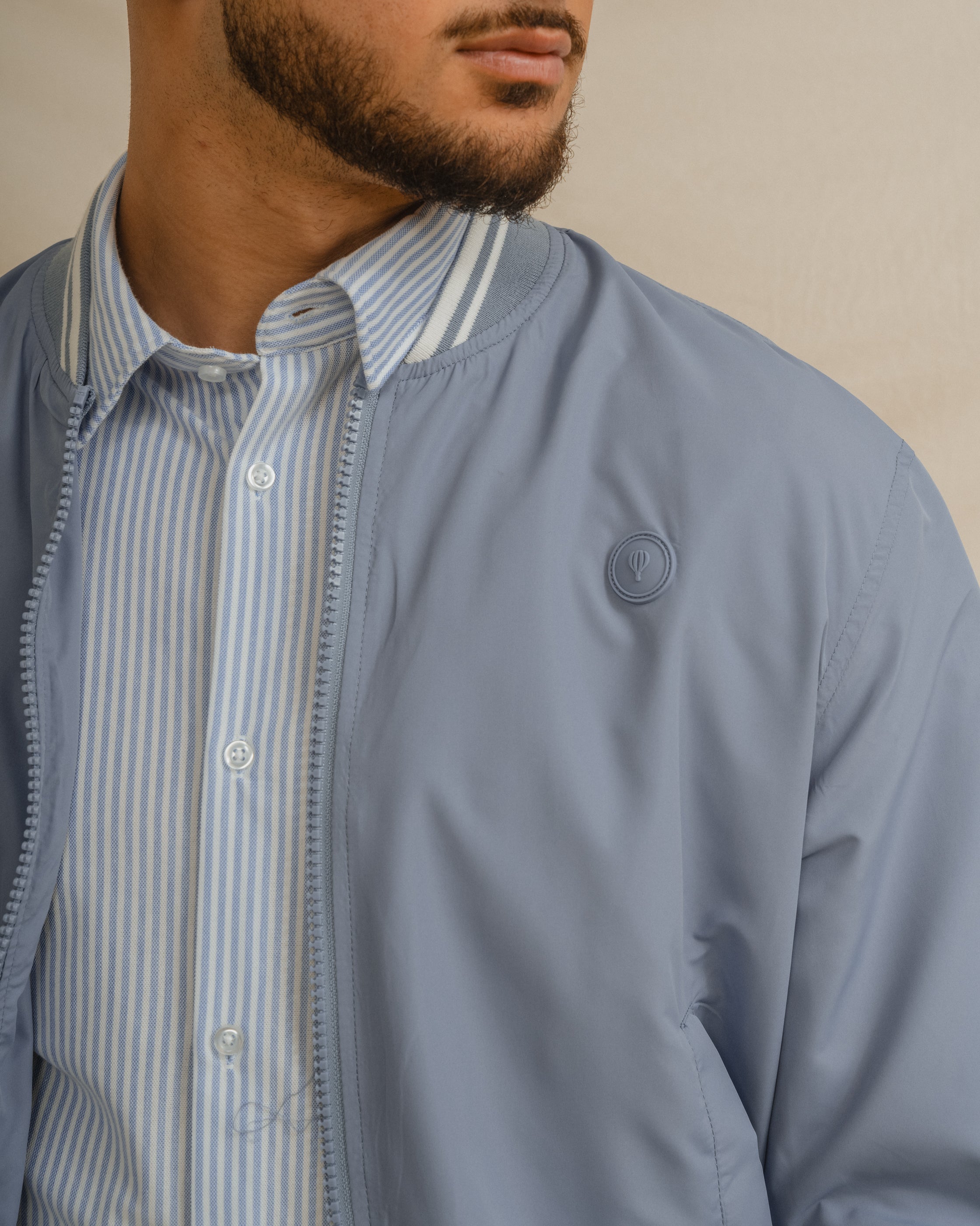 CAZADORA BOMBER LIGERA CELESTE