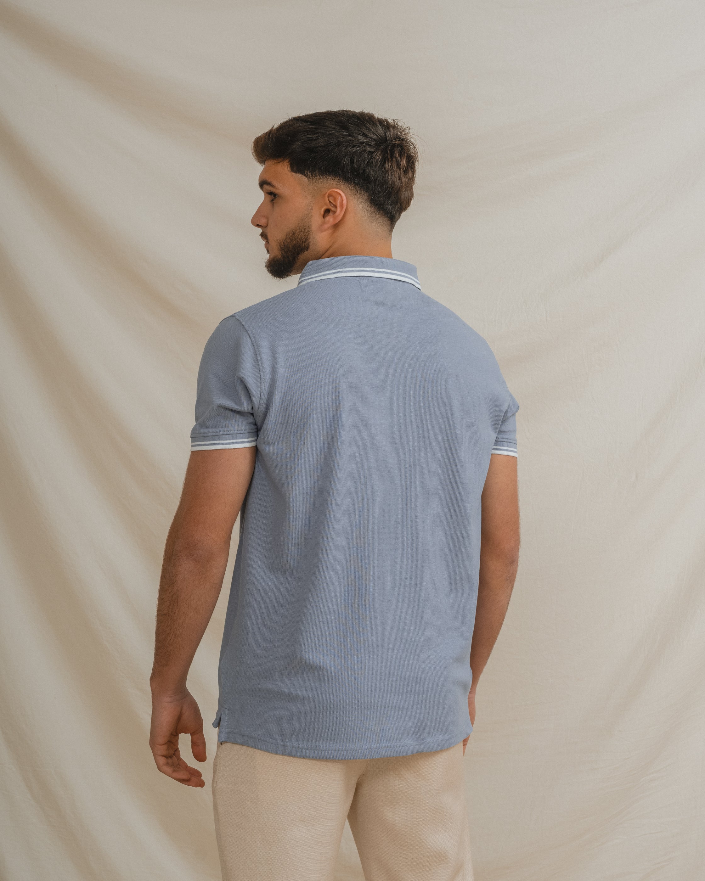 POLO BÁSICO CELESTE PIQUÉ LÍNEA