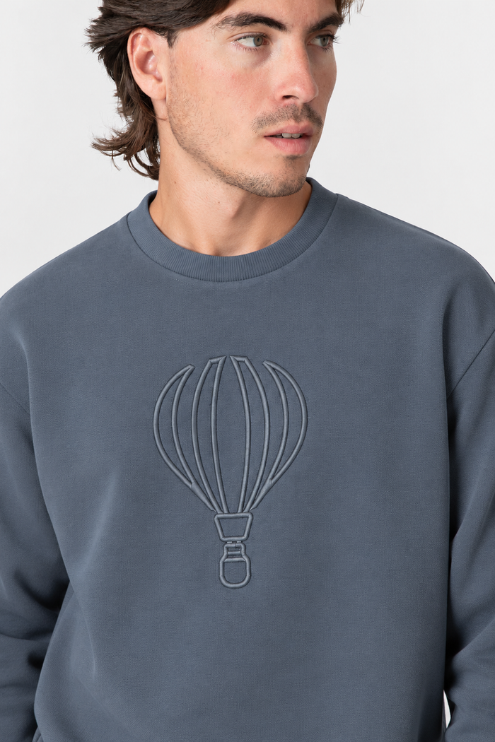 SUDADERA GLOBO BORDADO